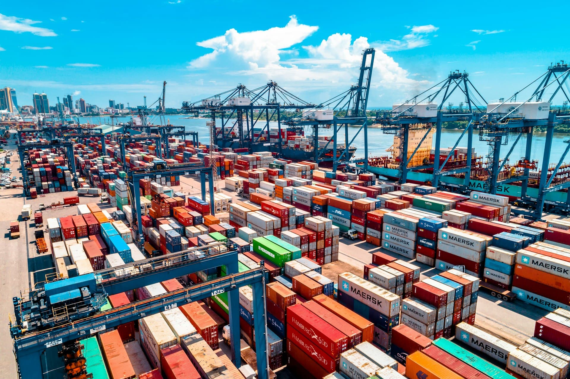 Aerial view of stacked shipping containers at a container terminal