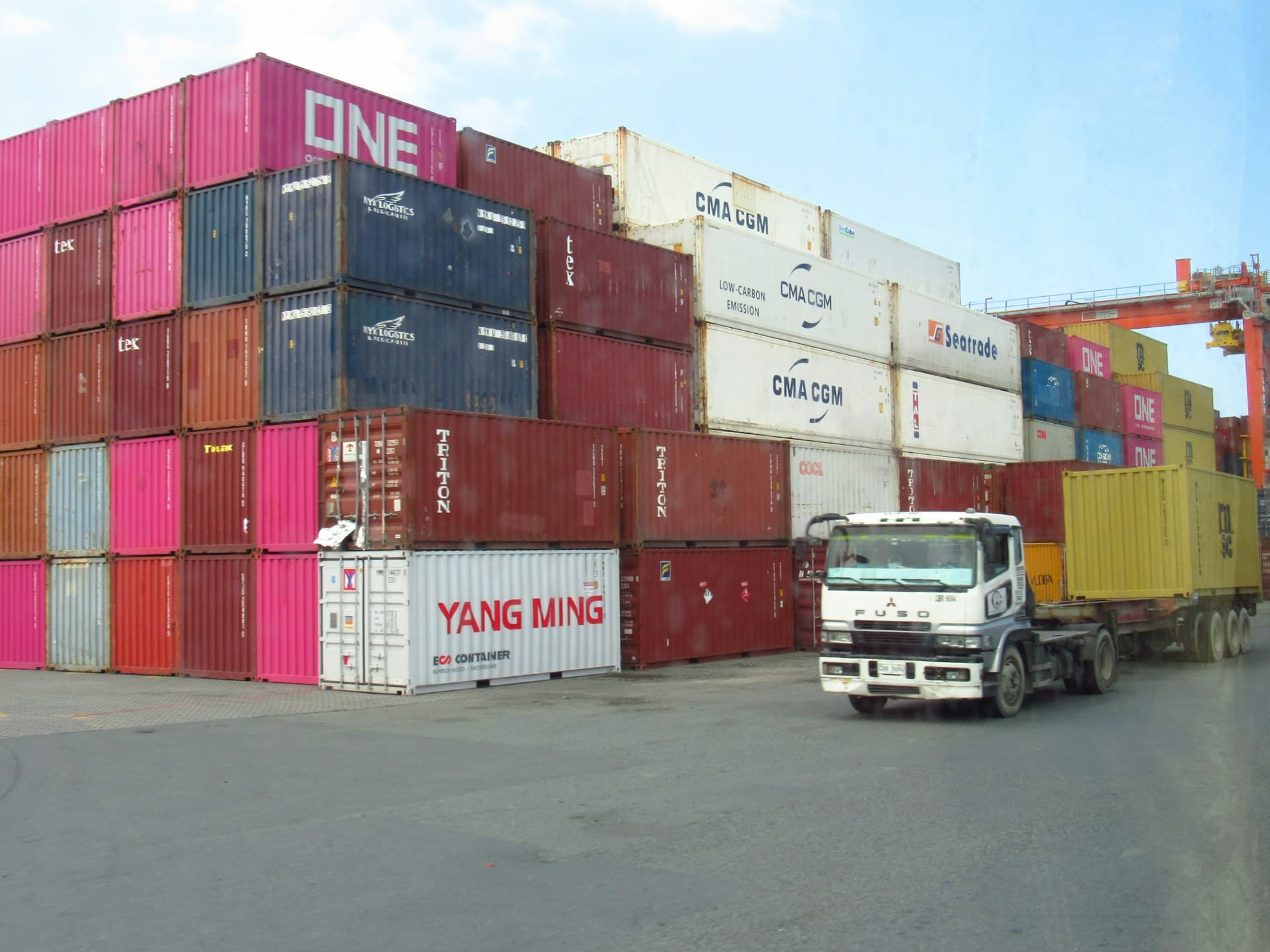 Shipping containers and a truck at a container yard