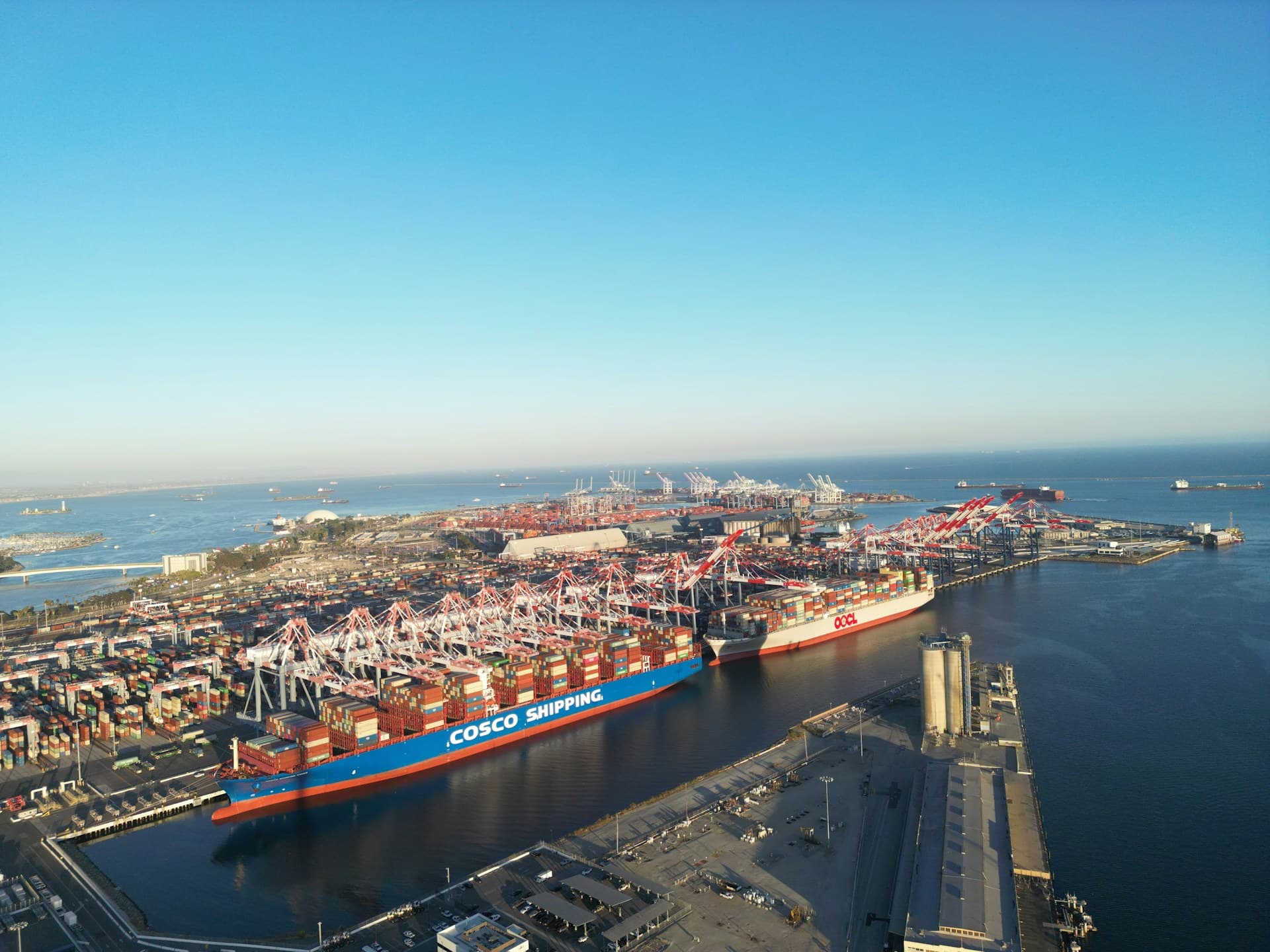 Aerial view of shipping port and cargo ships